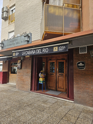 Esencia de Mesón La Cabaña del Río